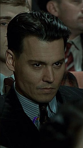 A cinematic aura like no other—Johnny Depp as John Dillinger in Public Enemies.