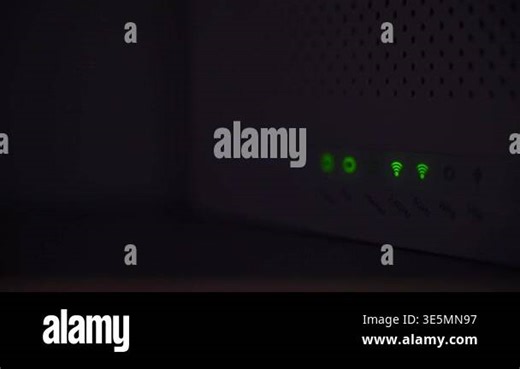 WiFi Router with Green LED Indicators Showing Active Connection. High quality FullHD footage
