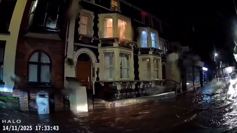 Heavy overnight flooding engulfs roadway in Abergavenny, UK
