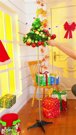 video, 5ft Pop Up Christmas Tree with Multi-Color LED String Lights Tinsel Perfect for Indoor Out...