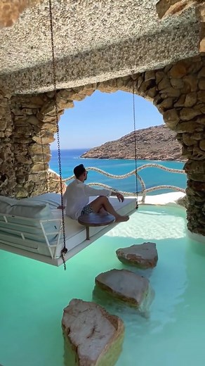 This is the ultimate bucketlist hotel in Greece 🇬🇷 📍 @calilo_ios , nestled on the picturesque island of Ios in the Greek Isles, offers a unique luxury escape that seamlessly blends artistic flair with environmental consciousness. This private beachfront retreat is renowned for its bespoke suites, each meticulously designed with unique themes that incorporate natural elements and stunning, handcrafted details. Set against the backdrop of golden sands and the azure Aegean Sea, Calilo provides a