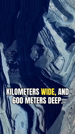 The massive Kalgoorlie Super Pit produces over 450,000 ounces of gold annually in Australia.