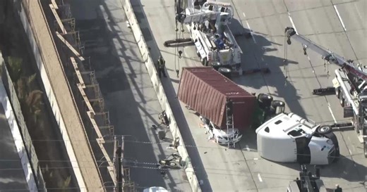 Big rig overturns on car on 405 Freeway in Seal Beach