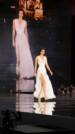 RichVogueX on Instagram: "Kendall Jenner solidified her status as a global ambassador for L’Oréal Paris with prominent appearances at the brand's "Le Défilé — Walk Your Worth" shows during Paris Fashion Week. 2025 Appearance (Spring/Summer 2026 Collection) • The Look: Jenner closed the 2025 show wearing a custom angelic white sheer gown from La Perla's Spring/Summer 2003 archive. The dress featured a ruched corseted bodice and a daring thigh-high slit. • The Setting: The event took place on Sept