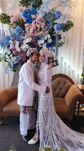 The first kiss of a beautiful bride in a West Java village #wedding #bride #marriage