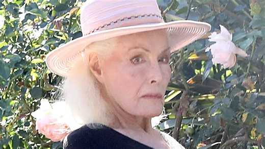 Batman star unrecognisable as she picks up delivery on scooter… but who is it?