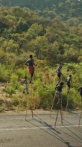 It may look like kids just having fun on tall stilts, but it’s actually a living legacy of courage ✨ In the Banna tribe of southern #Ethiopia, young boys train to walk on towering stilts as part of a rite of passage that symbolizes independence and strength—rooted in an ancient practice once used by herders to stay safe on the open plains. | Different photos