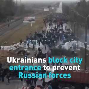 14K views · 36 reactions | Thousands of citizens formed a blockade at the entrance of the southeast Ukrainian city of Enerhodar, using trucks, barricades, and a human chain to prevent Russian forces from entering. The city is the home to one of the largest nuclear power plants in the world. | CGTN America | Facebook