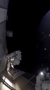 A nighttime spacewalk above Earth. Most real spacewalk footage at night appears almost completely black due to camera exposure limits in extreme low-light. This visual explores what a night spacewalk could look like if those limits didn’t exist, with Earth’s city lights visible below. #space #earthfromspace | Jack Daniel