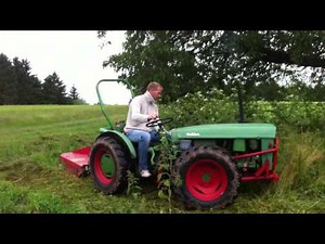 Holder AG35 mit Mulcher Knicklenker Traktor mulcht Hochgras Schmalspurschlepper Schlepper