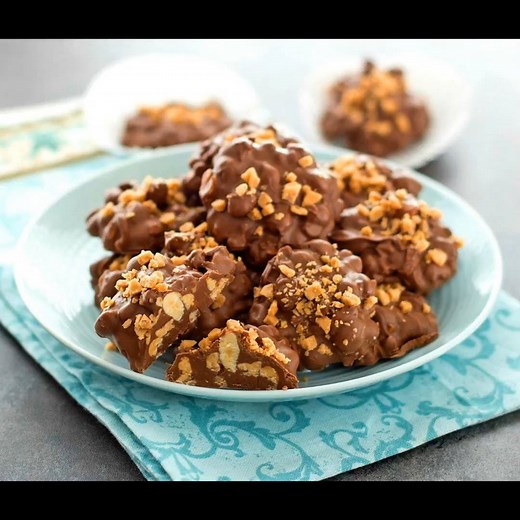 Homemade candy making doesn’t come any easier than these decadent Toffee Peanut Clusters. FULL recipe here: https://www.melissassouthernstylekitchen.com/toffee-peanut-clusters/ | Melissa's Southern Style Kitchen