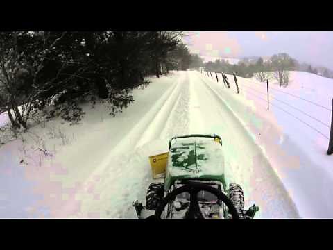 John Deere 1025r - plowing snow
