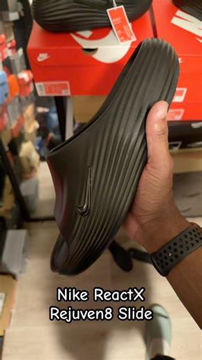 Quick look at the Nike ReactX Rejuven8 Slide in All Black alongside the Clog