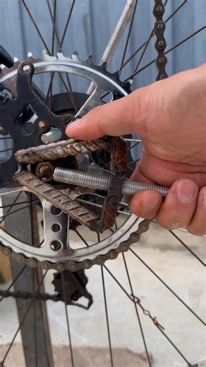 Homemade Rebar Tool Secures Motorcycle Axle Nut Removal