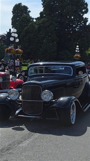 1932 Ford three-window hot rod coupe rumbles through downtown Victoria Northwest Deuce Days car show