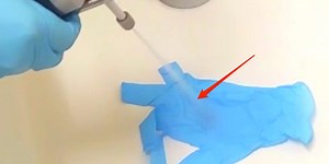 Watch how liquid nitrogen makes a medical glove so brittle it snaps like plastic