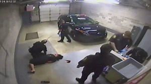 Handcuffed woman knocked out after being slammed by police | Daily Mail Online