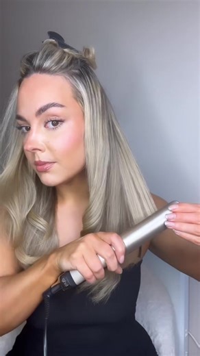 Achieve a Blow Dry Effect: Curl Your Hair with Straighteners