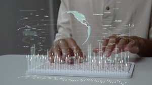 Download A men using computer for connecting to a cloud computing data hologram. business digital background. for free