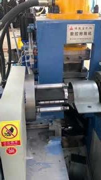 Fully automatic flat steel band clamp manufacturing machine