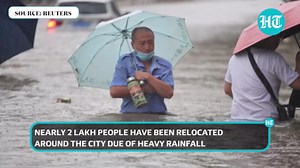 China: Deadly floods kill over 20; people stuck in subway rescued; dams damaged