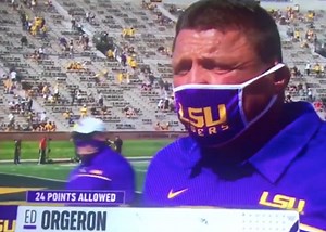 Coach O speaking through a mask during an interview might as well be a foreign language
