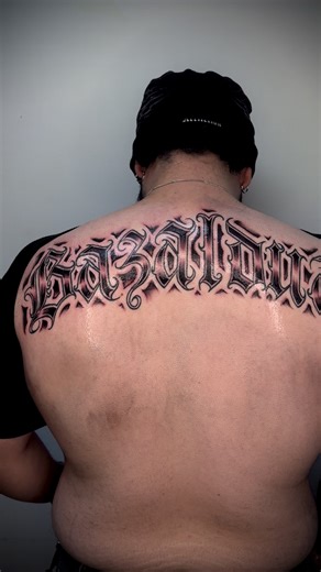Cursive Last Name Tattoo: A Unique Back Design