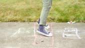 Girls Playing Hopscotch