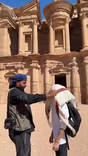 In our culture, a guest is a gift. 🐪 When I place the shemagh over someone’s head, it’s more than a scarf — it’s a welcome into our world. A small way of saying, you are safe here, you are one of us. I’ve done this countless times in Petra, but every time feels different. Some smile, some laugh shyly, others close their eyes and take a deep breath — like they can feel the history woven into the fabric. The desert has its own kind of generosity. We don’t measure it in what we have, but in what w