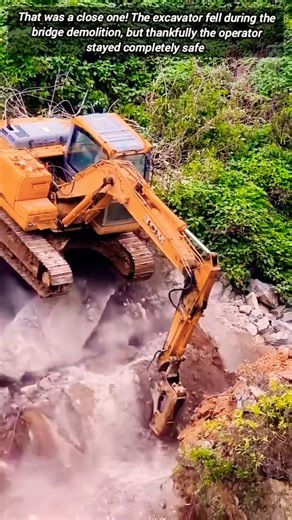 Excavator Falls During Demolition But The Operator Stays Safe