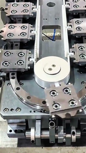 Rotary table turns, precision plates align in silent rhythm