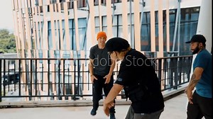 Group of stylish hipster dance and move foot step to hip-hop music at corridor mall. Diverse hip-hop dancer group perform break dance or practice street dance. Lifestyle. Outdoor sport 2024. hiphop.