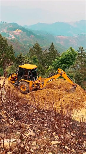 JCB Backhoe Loader Mountain Road Building and Trench Excavation