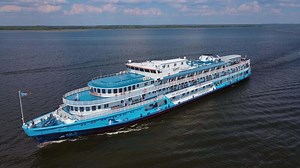 Download Aerial view of a cruise ship on the Volga River in Russia