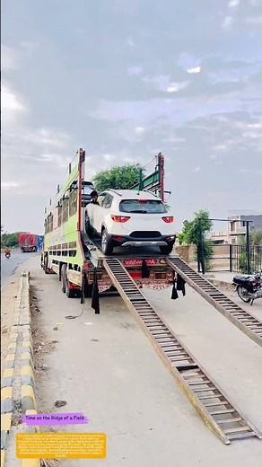 How a Driver Reverses an SUV Off a Multi-Level Car Carrier