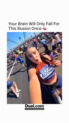 Interesting As Viral on Instagram: "Your brain isn’t broken — it’s being tricked 🤯👀 In this perfectly-timed marathon clip, a runner holds her camera completely still while everyone behind her keeps moving. For a split second, your brain becomes convinced the entire crowd is walking backwards… and she’s gliding forward like she’s on an invisible escalator. But it’s all an illusion. Our brains rely on motion patterns to understand the world, and when something breaks that pattern — like a still 