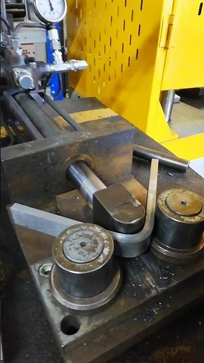 SIDE BEND TEST OF TIG WELDED CARBON STEEL SAMPLE IN METALLURGICAL TESTING LABORATORY