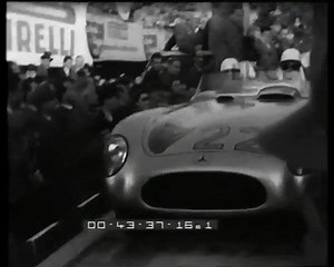 In 1955 Moss won Italy’s thousand-mile Mille Miglia road race, an achievement Doug Nye described as the “most iconic single day’s drive in motor racing history.” Motor Trend headlined it as “The Most Epic Drive. Ever.” Moss, then 25 years old, drove one of four factory-entered Mercedes-Benz 300 SLR sports-racing cars. Based on the W196 Grand Prix car They had spaceframe chassis and magnesium-alloy bodies, and their modified W196 engines ran on a mixture of petrol, benzene, and alcohol. The team’