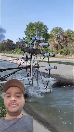 Beautiful Water Wheel Creating a Stunning Waterfall