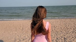 Back View Woman Walking On Beach Stock Footage Video (100% Royalty-free) 1009782827 | Shutterstock