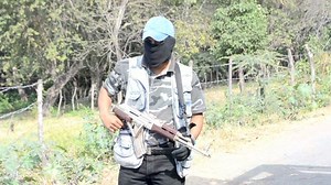 Vigilantes clash with Mexican cartels
