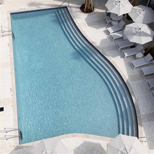 Interstyle | 1”x2” glass tile pool waterline with 1”x1”x6” V-caps finishing the step edges in matching color. Big thanks to Davenport Post Pools for... | Instagram