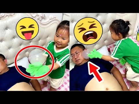 Playing a bubble to scare dad Bubbles make dad scared Most warm parent-child companionship Man's