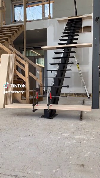 Steel tube mono-stringer with 1-3/4 white oak treads. Check out this time lapse of the tread install from start to finish from @Stairhaus Inc. 🔥 #staircasedesign #staircaseinstallation #joinery #carpentry #carpentrywork #tradespeople