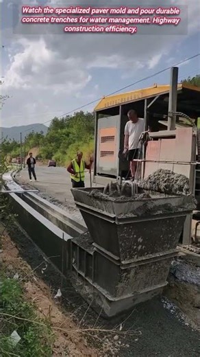 ​Slipform paver creates durable concrete drainage channel rapidly.