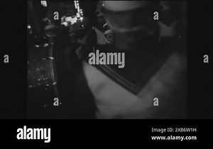 BOSTON - 1963 - The Cardinal has its movie premiere in Boston, Massachusetts, where a high school marching band performs and Cardinal Cushing gives a speech in the theater for director Otto Preminger and the other attendees Stock Video Footage - Alamy