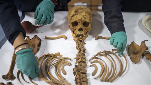 Haunting 1,000-year-old mummy found seated with brown hair still visible