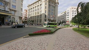 Sightseeing bus bringing new group of tourists to admire famous city places