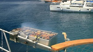 Barbecue mount with grill attached on the gulet yacht. BBQ on the Boat. Boat Barbecue specifically designed to make having a BBQ simple, safe and an enjoyable event