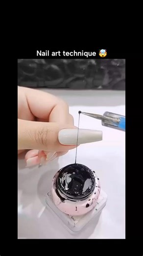 Lucky Clips on Instagram: "The post features a 13-second video tutorial on a DIY nail art technique, using threads stretched across long white acrylic nails to form precise black stripes via gel polish application, showcasing meticulous handiwork. Posted on December 17, 2025, by @Lathief22 —a user with a "daily" bio suggesting routine beauty content—it quickly amassed 223,000 views and 109 likes, primarily from Indonesian commenters admiring the creativity and effort. Replies highlight the self-
